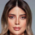 Girl showing the light brown Melanina Colored Lenses Dubai
